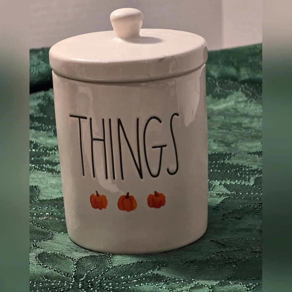 Rae Dunn Cream Jar with‎ Orange Pumpkin Accents with 'THINGS' text.